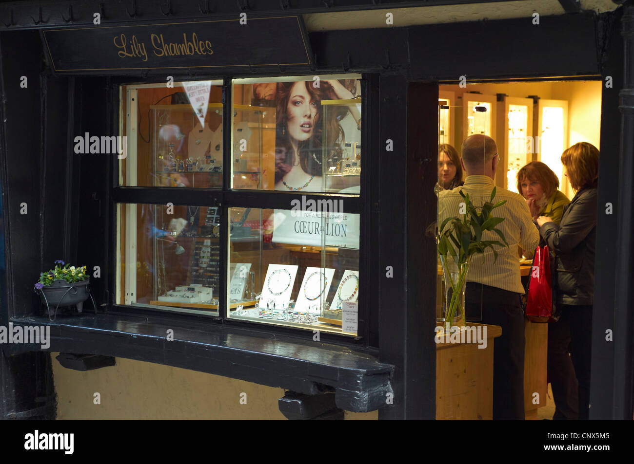 Customers in a jewellery shop in the Shambles area of York. England