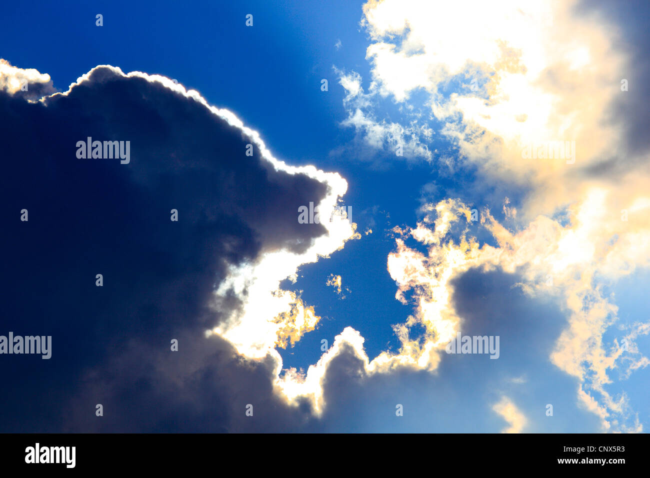 Sunlit clouds in the sky hi-res stock photography and images - Alamy