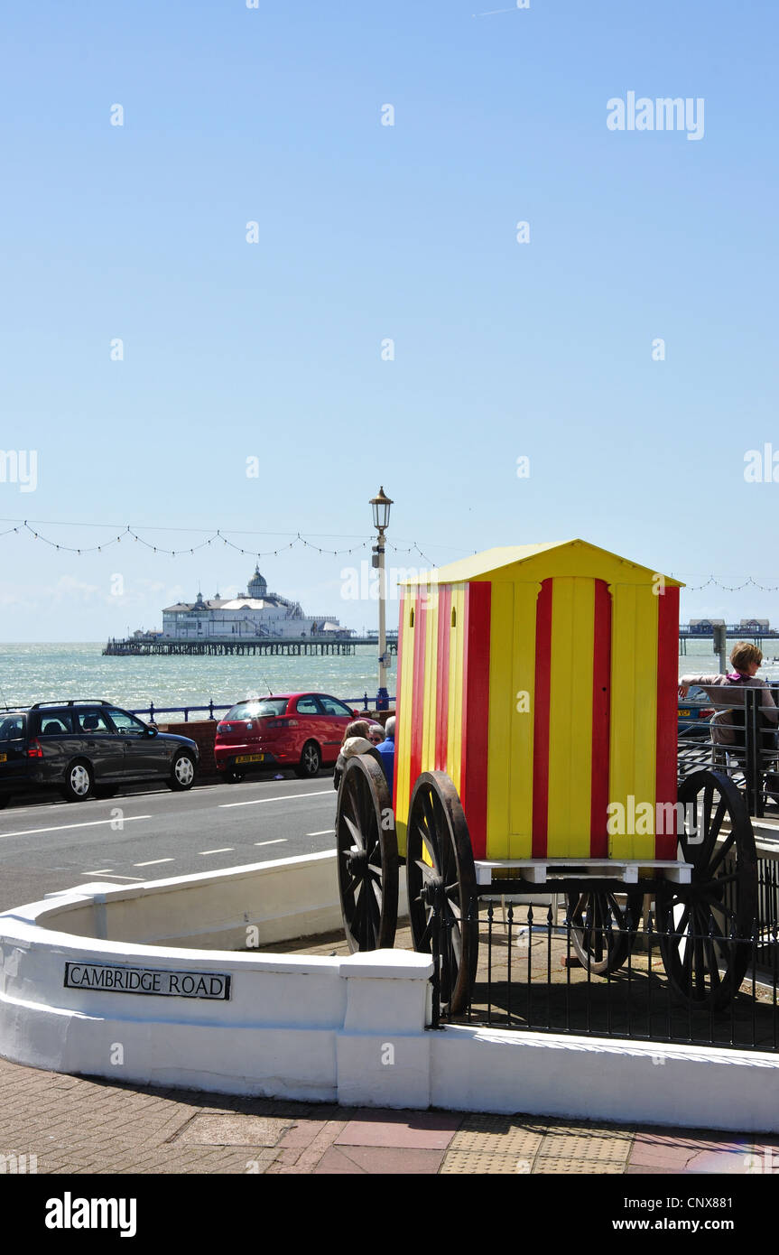 Victorian bathing machine and Eastbourne Pier, Royal Parade, Eastbourne, East Sussex, England, United Kingdom Stock Photo