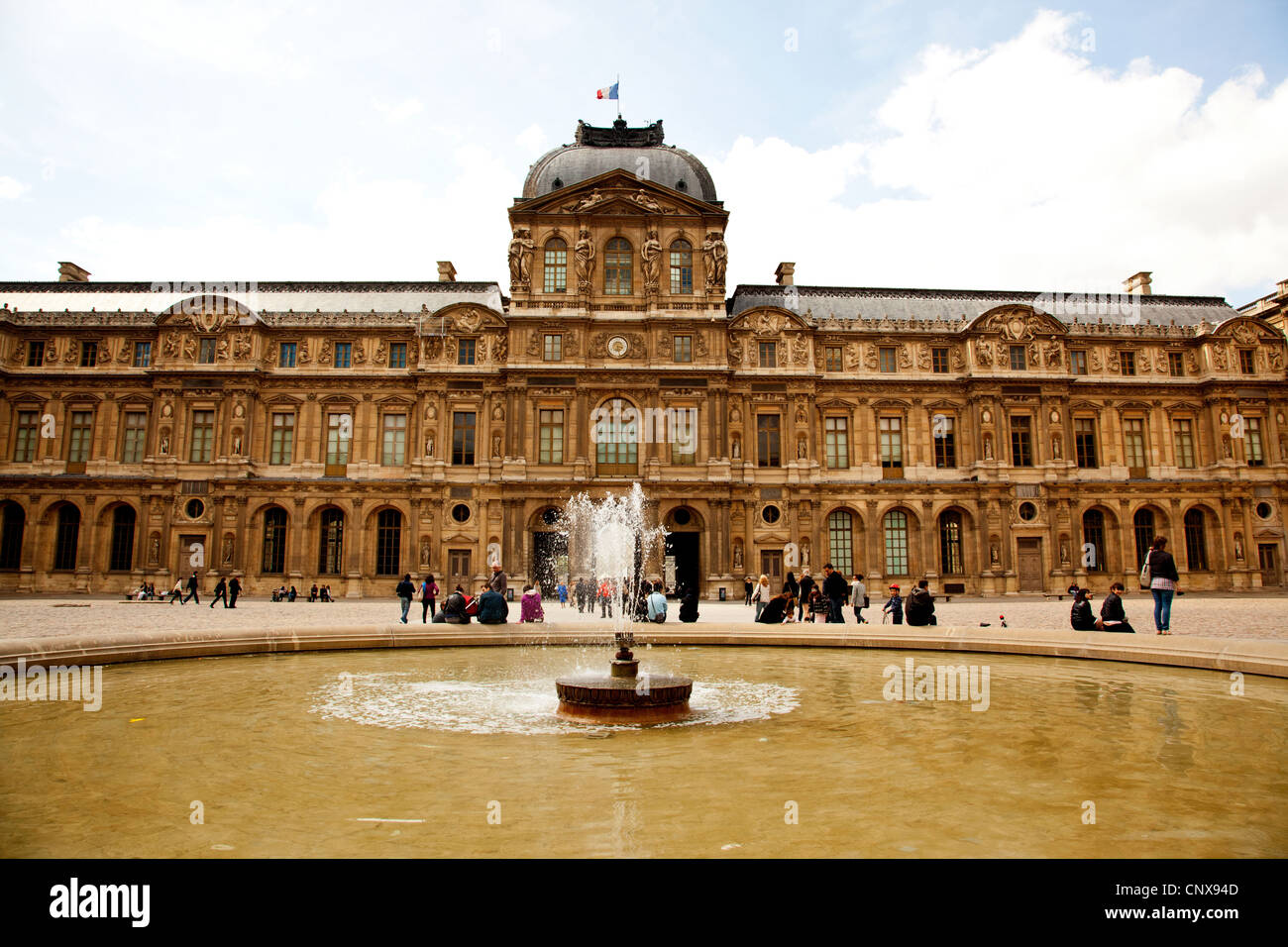 Fountain in Cour Carree in front of Musee du Louvre in Paris France ...