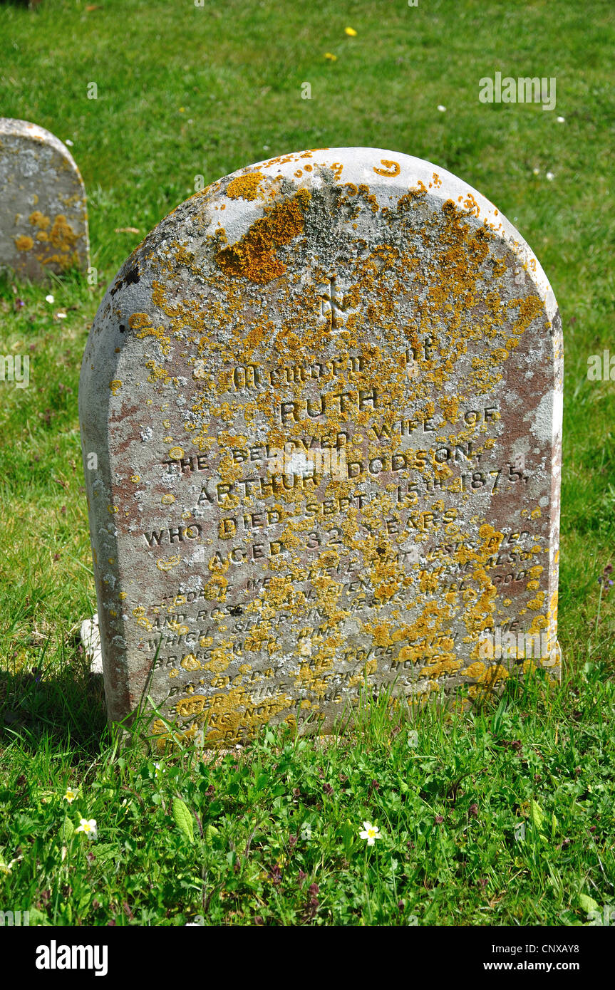 Ancient gravestones in churchyard, Holy Trinity Church, Upper Dicker, Arlington, East Sussex, England, United Kingdom Stock Photo