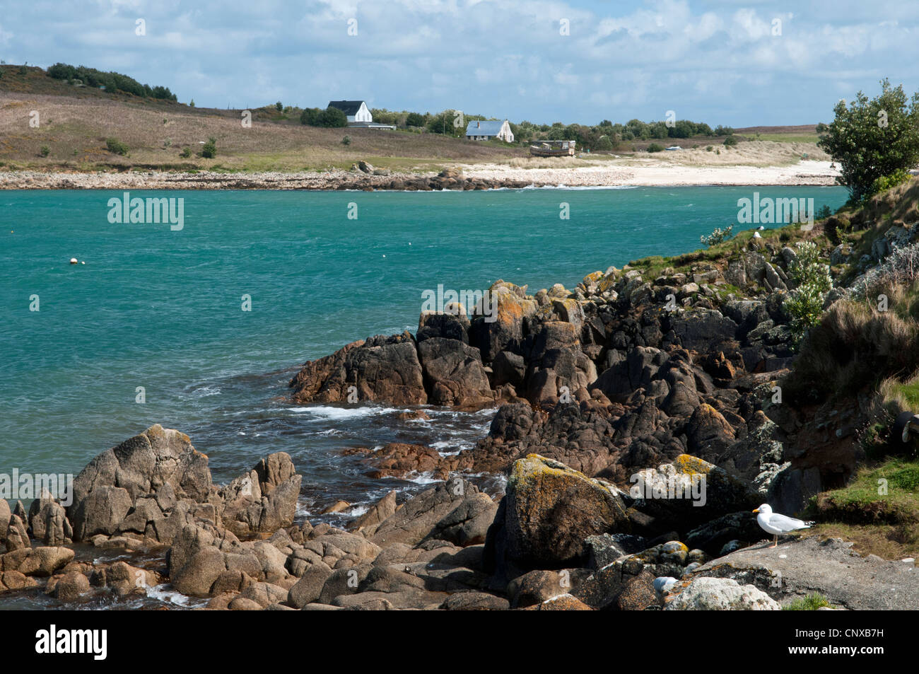 Looking across to the island of Gugh from St Agnes on the Isles of Scilly UK Stock Photo