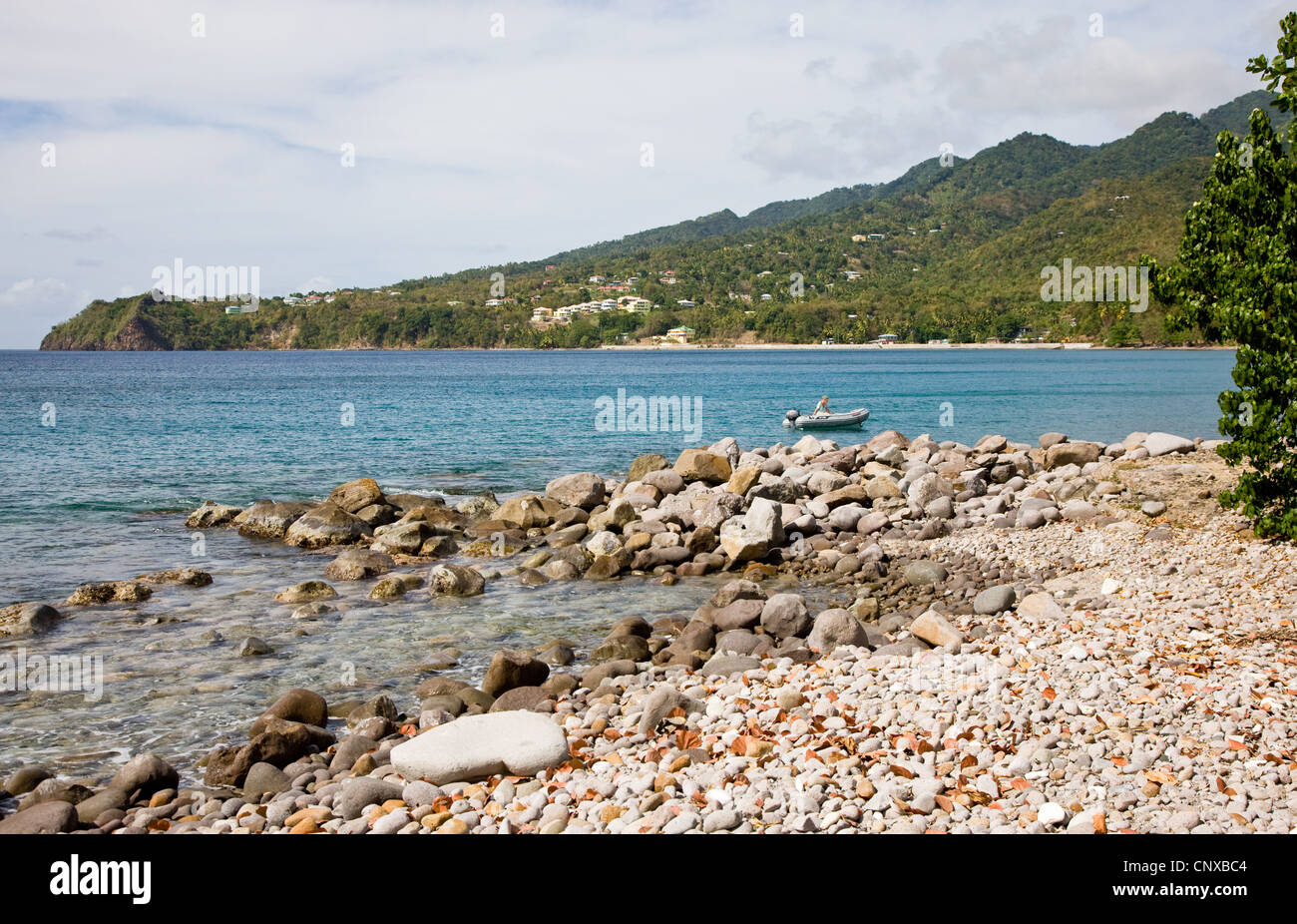 Small beach on the Cabrits National Park peninsula in Douglas Bay in the north west of Dominica Stock Photo