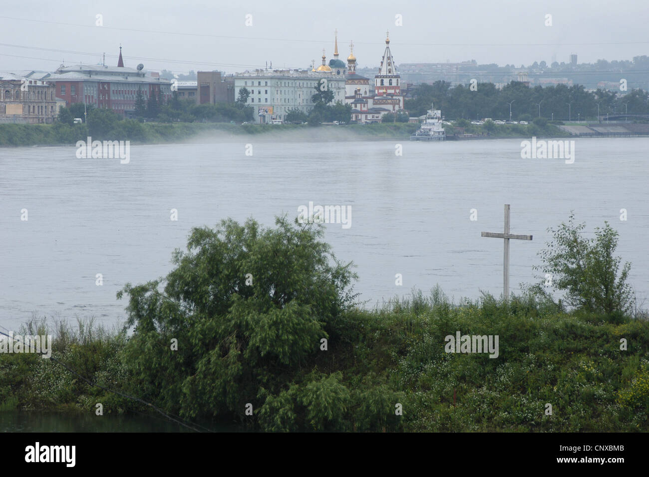 Cross on the place where Admiral Alexander Kolchak was executed in 1920 on the Angara River in Irkutsk, Russia. Stock Photo