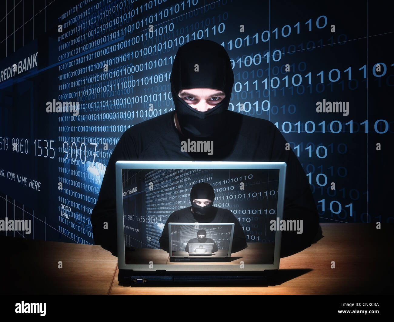 portrait of caucasian hacker with balaclava Stock Photo