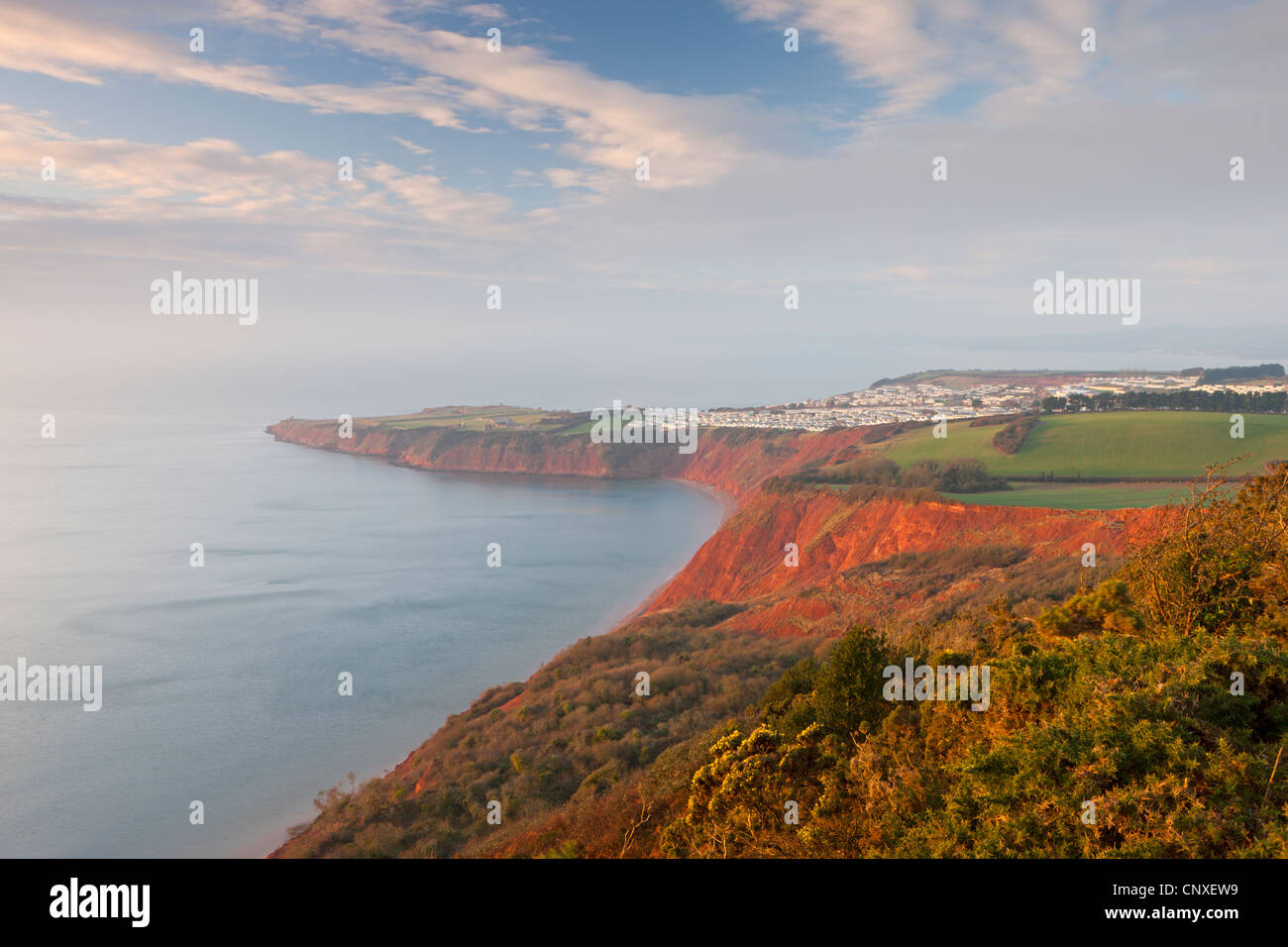 Looking over Littleham Cove towards Straight Point, and a clifftop caravan park, Exmouth, Devon, England. Winter (January) 2011. Stock Photo