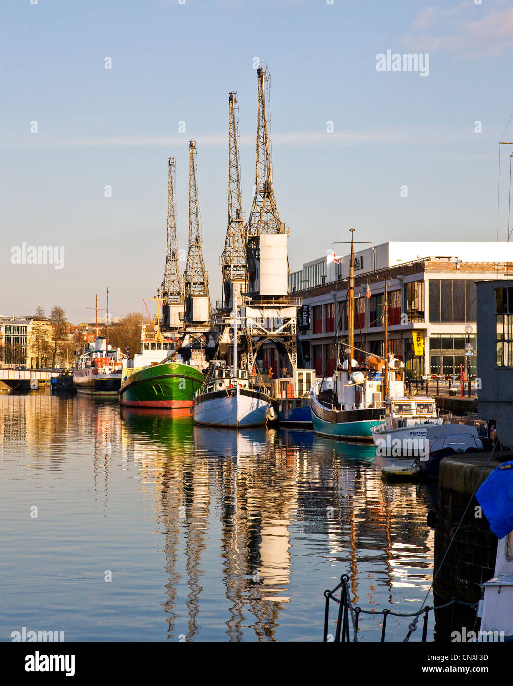 Disused cranes by the M shed museum on Bristol's Floating harbour Stock Photo