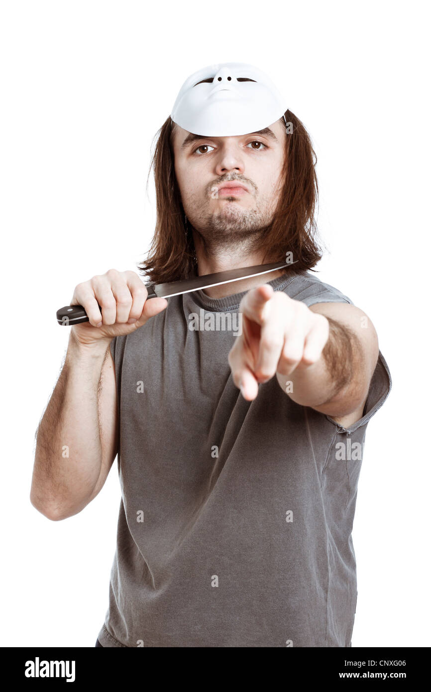 Scary killer horror man holding knife and pointing at you, isolated on white background. Stock Photo