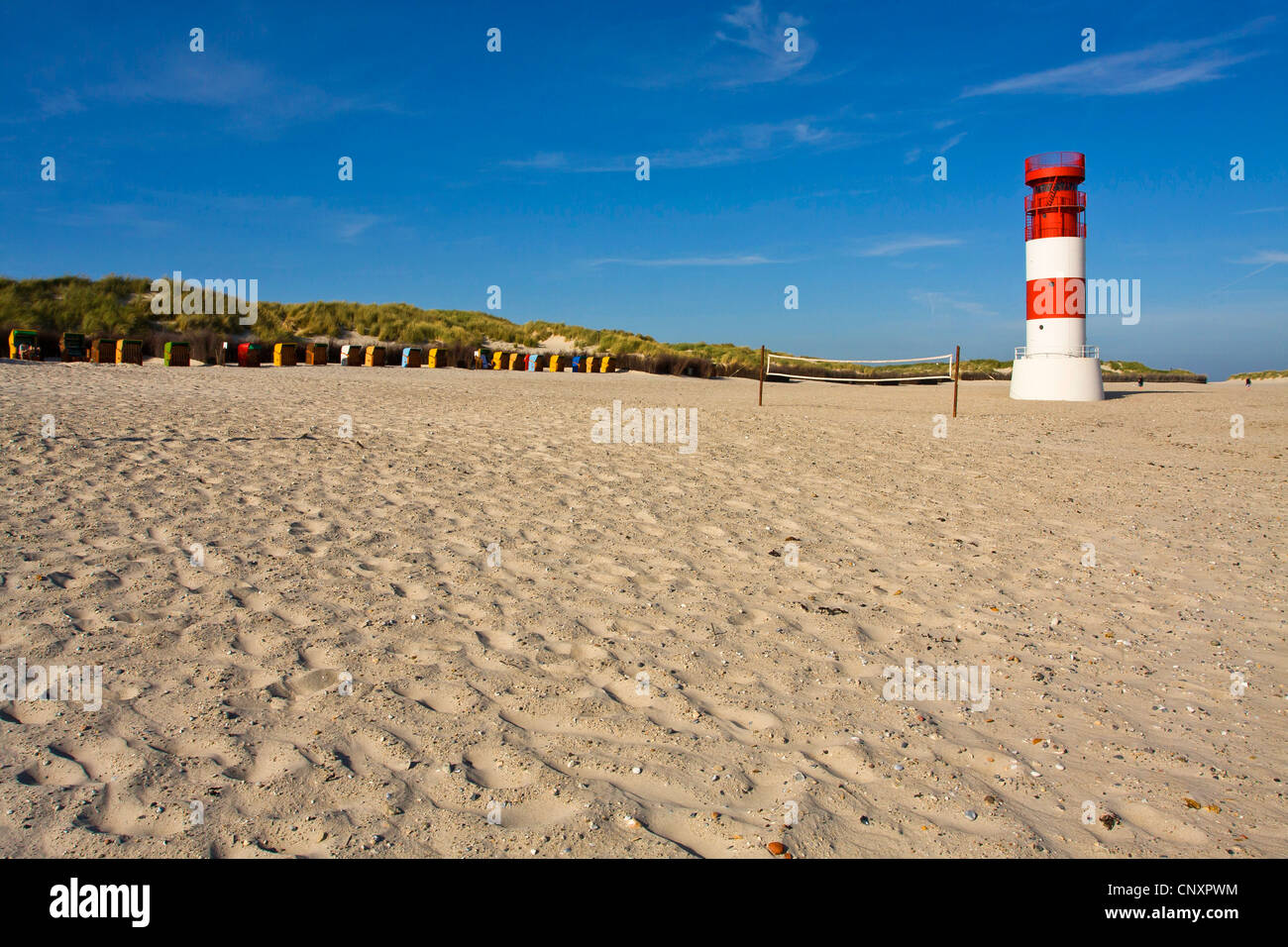 lighthouse on sand beach, Germany, Schleswig-Holstein, Helgoland-Duene Stock Photo