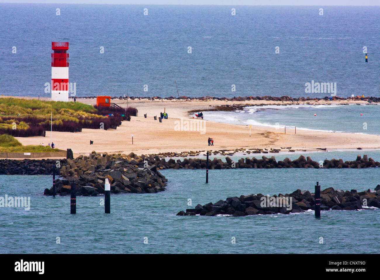 view at Dune with sand beach, wave breakerss and lighthouse, Germany, Schleswig-Holstein, Heligoland Stock Photo