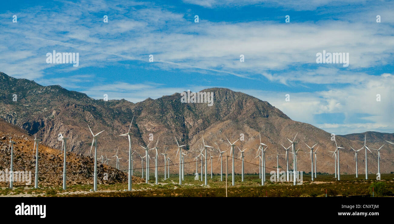 wind wheels in front of mountains along Interstate 10, USA, California Stock Photo