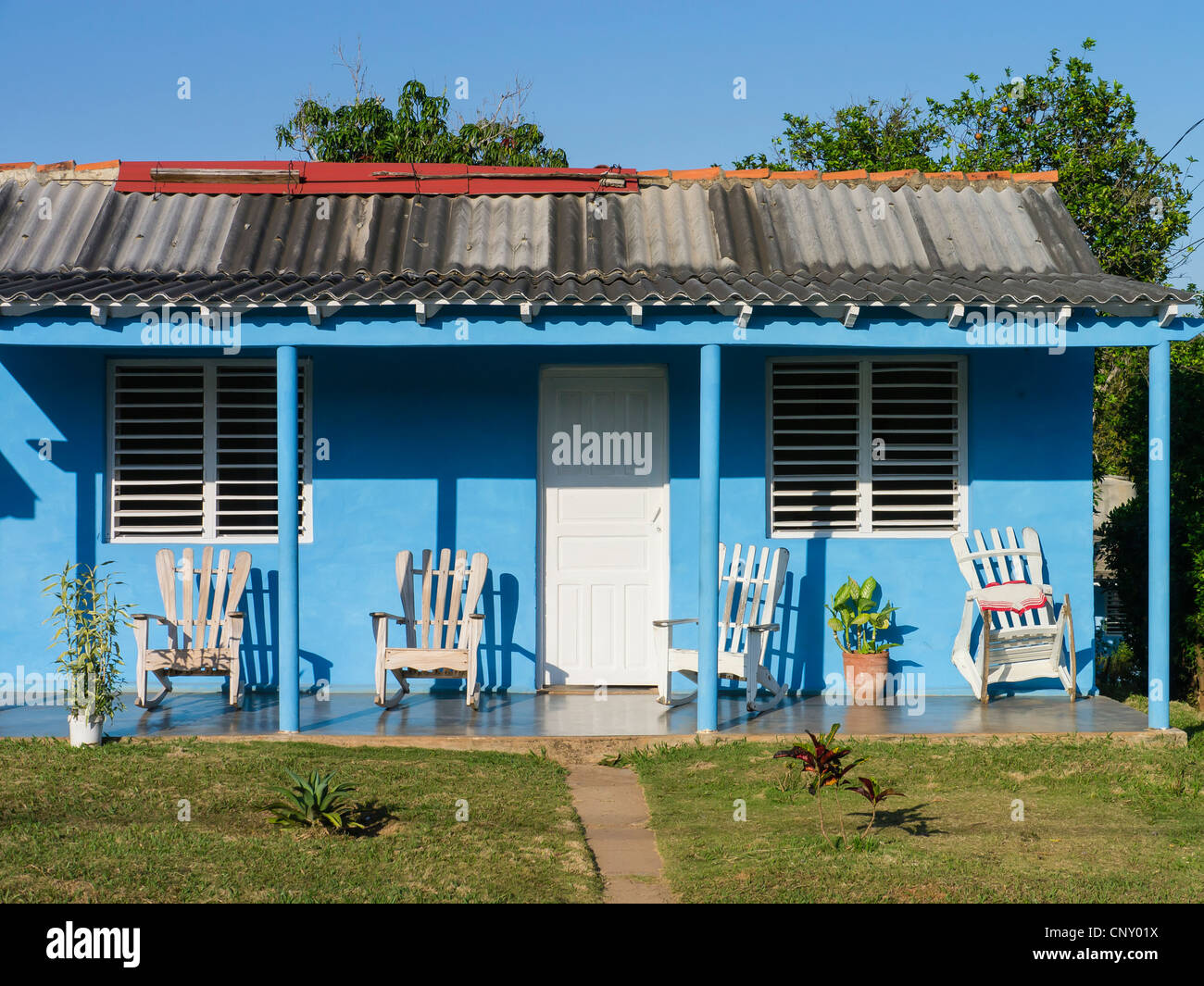 A front elevation of a small colorful house in the small town of Viñales, Cuba located in Pinar del Rio province. Stock Photo