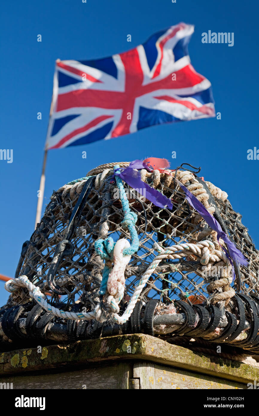 Lobster pot and Union Jack flag, Beesands, Devon, England Stock Photo