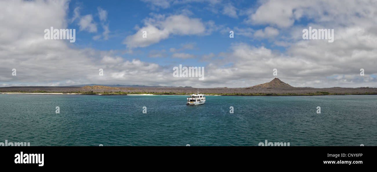 ship in front of Santa Cruz and Dragon Hill, Ecuador, Galapagos Islands Stock Photo