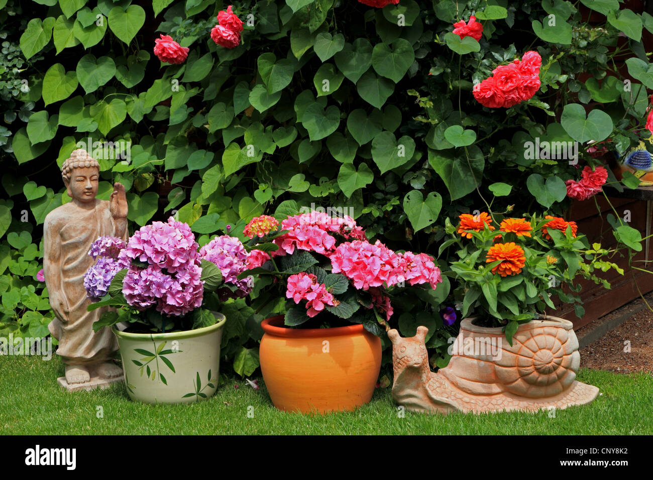 Summer house with flowers and garden figures, Germany Stock Photo - Alamy
