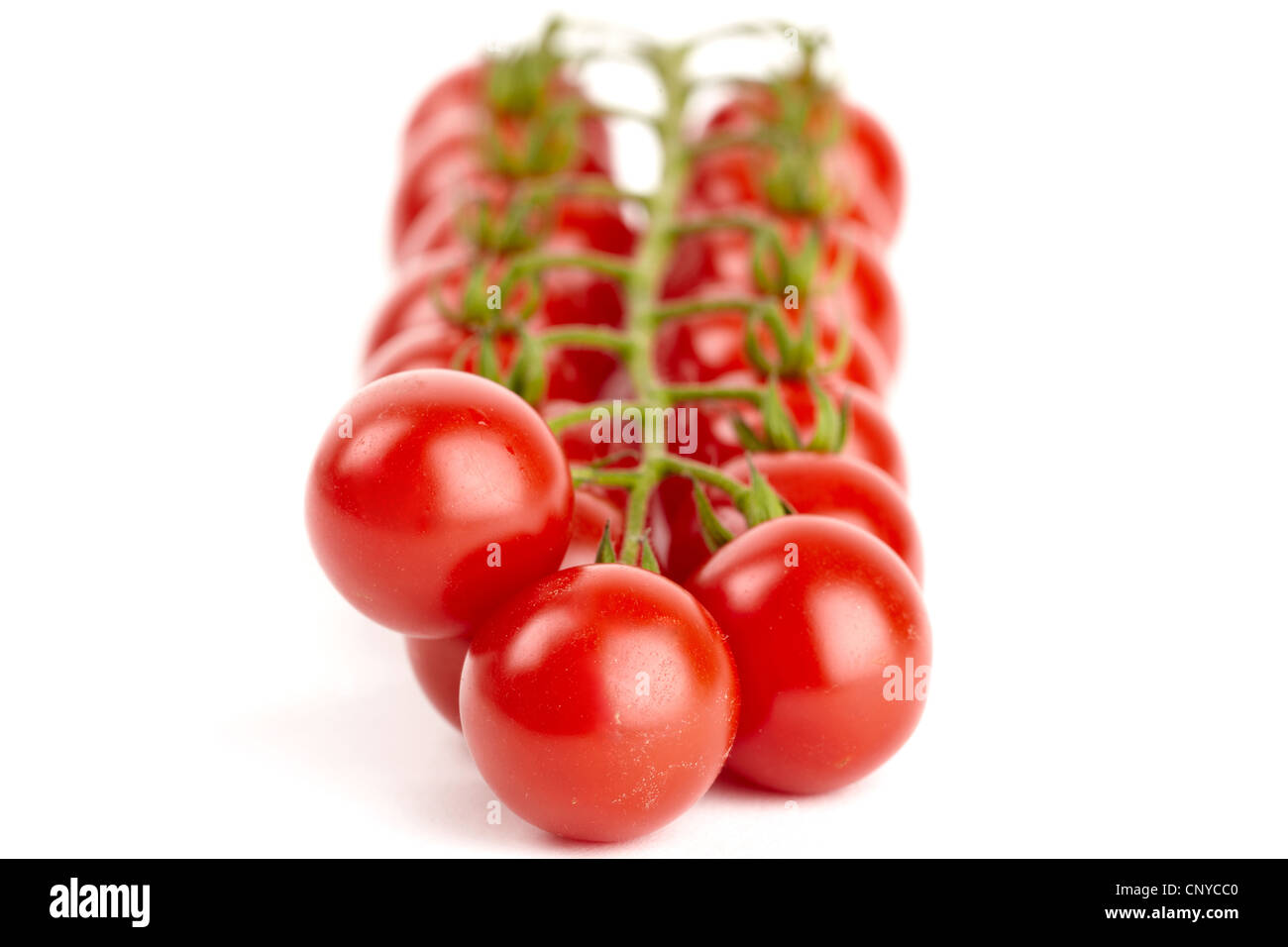 Cherry tomatoes isolated on white background Stock Photo - Alamy