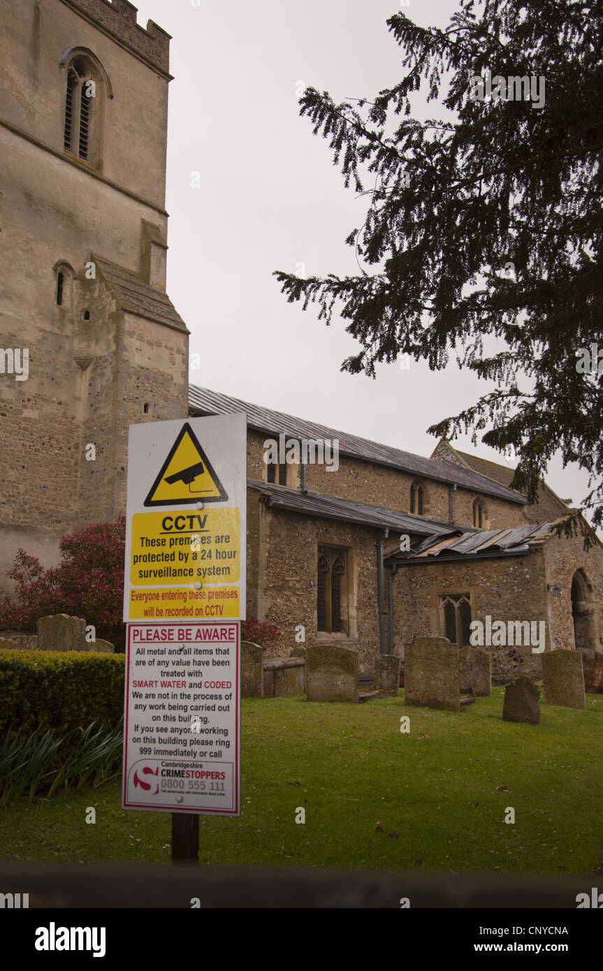 CCTV and security signs at church after thieves stole lead from roof Stock Photo