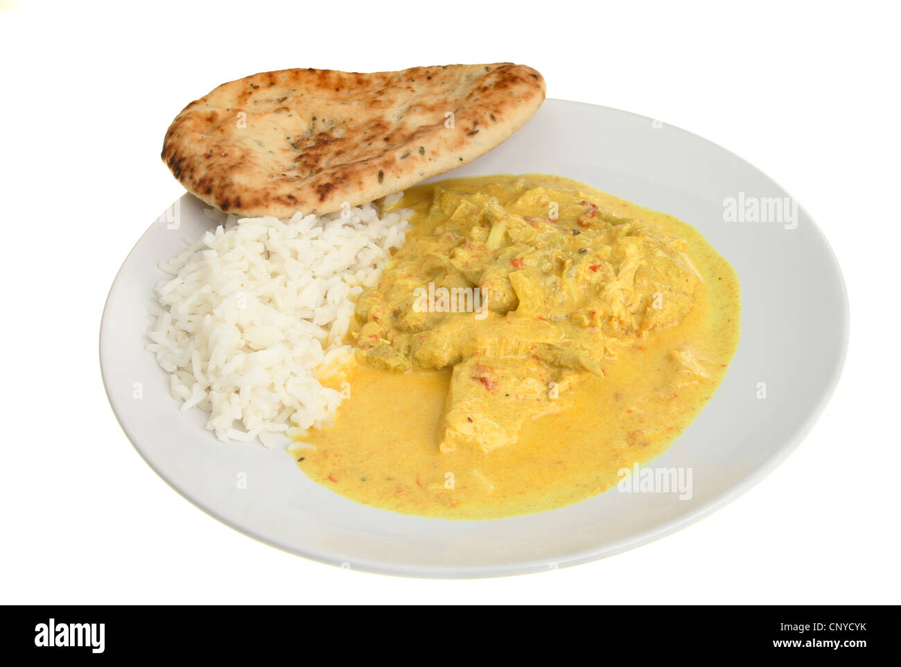 Chicken curry, rice and a naan bread on a plate isolated against white Stock Photo