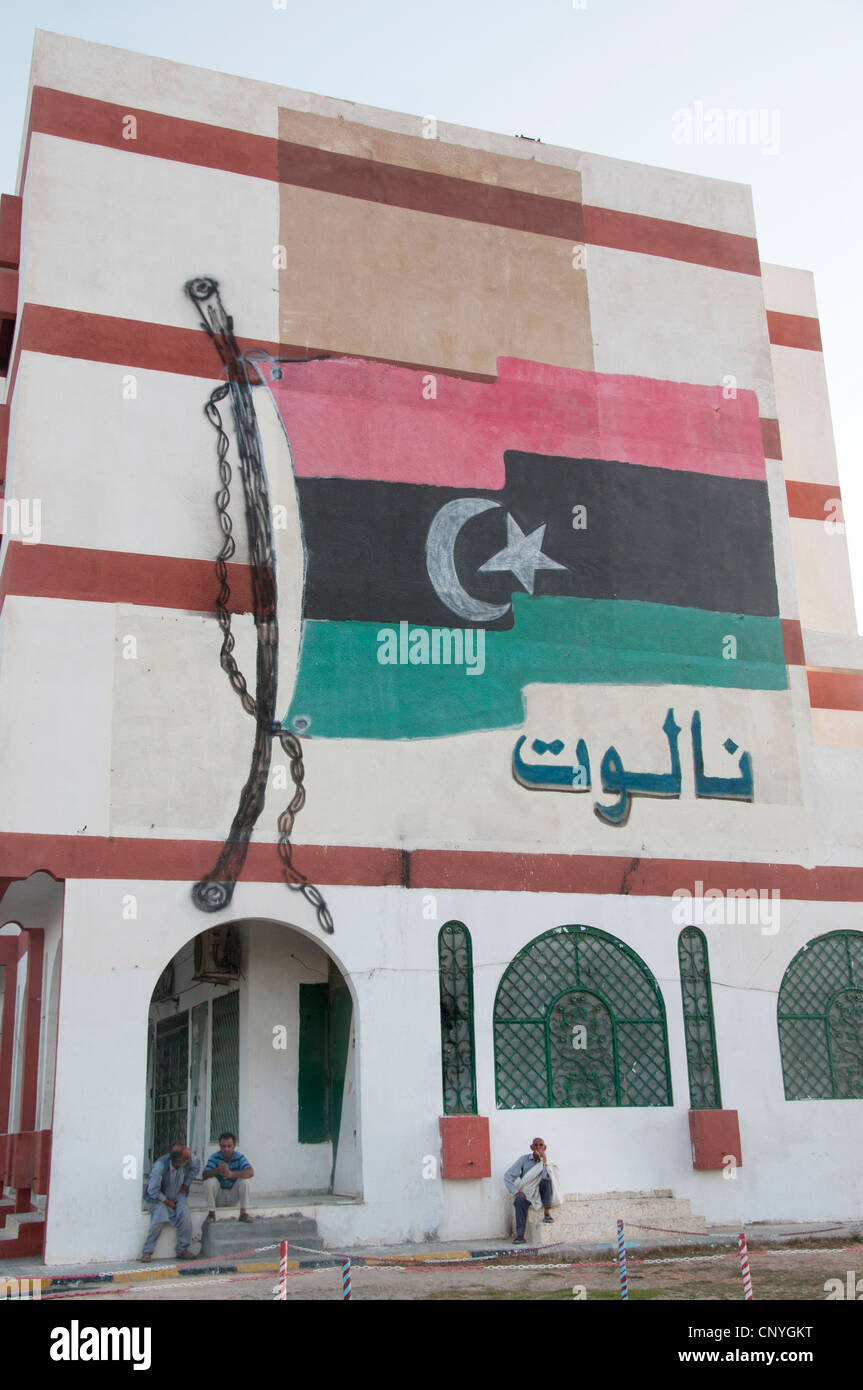 Libya September 2011. Nalut. Building with giant new Libyan flag painted on the wall Stock Photo