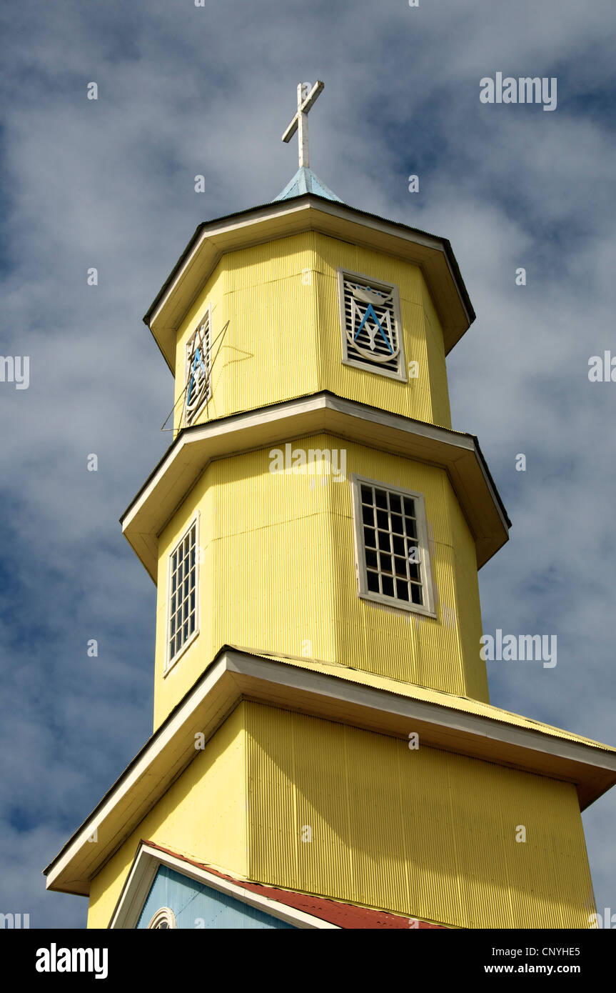 Yellow tower Iglesia San Carlos de Borroneo Conchi Chiloe Chile Stock Photo
