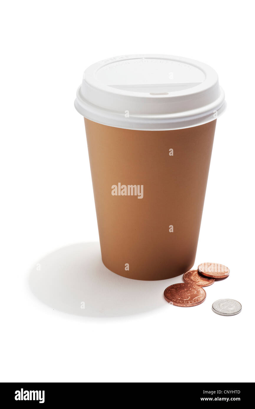 A takeaway drink cup with British coins by the side Stock Photo