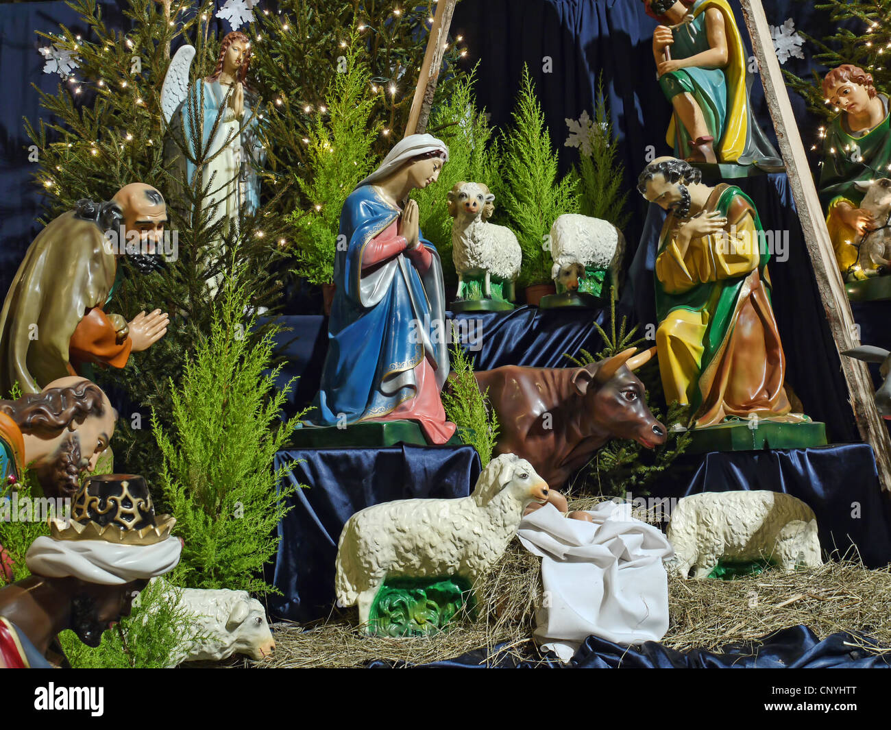 Christmas crib figures representing Holy Family, three wisemen, shepherds and animals Stock Photo