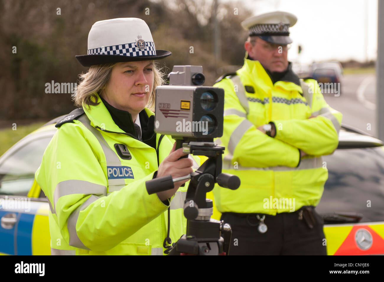 Traffic police officers operating a speed trap Stock Photo