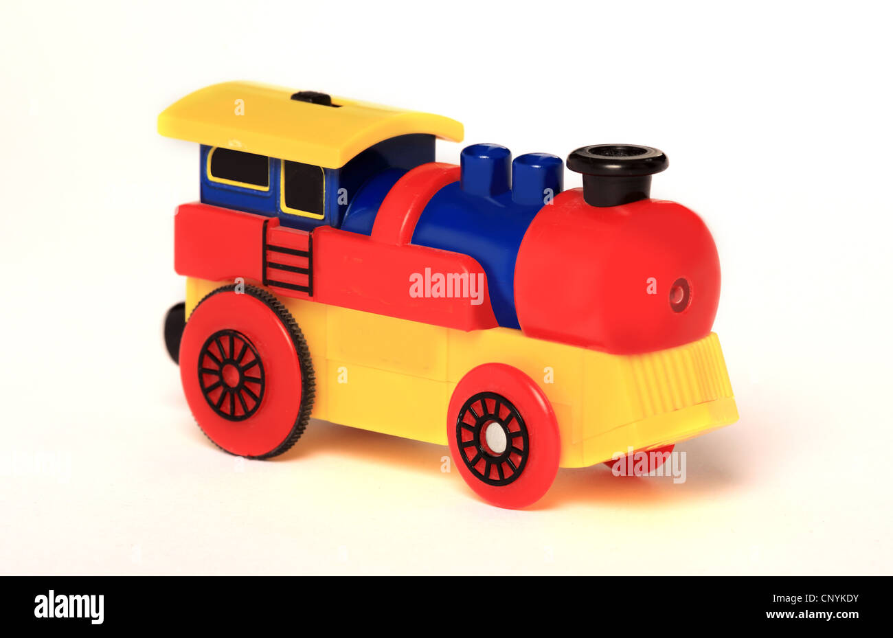 Multi coloured plastic toy train. Stock Photo