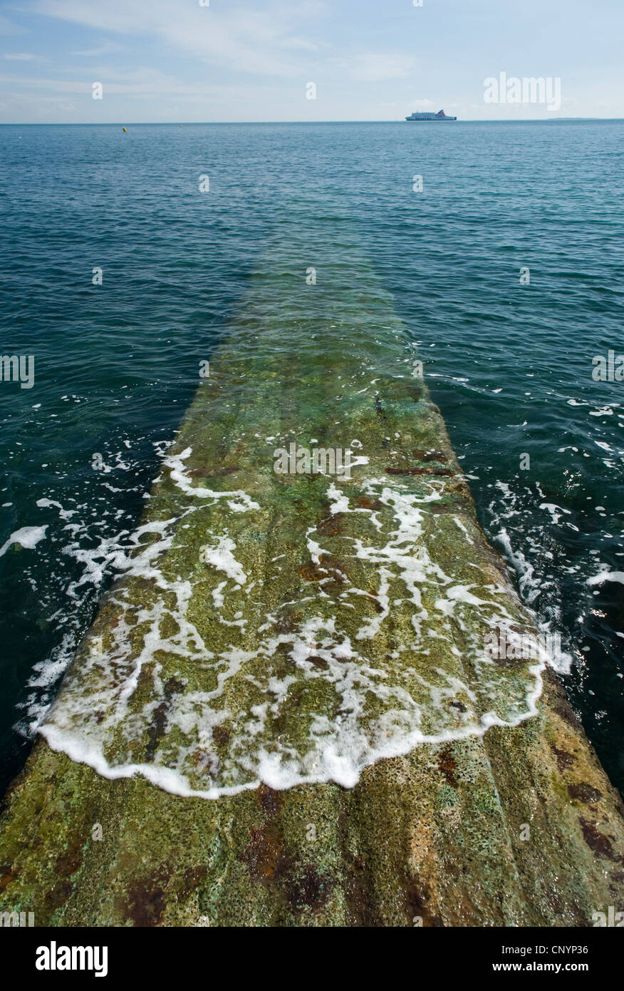 Partially submerged jetty, Belfast Lough. Stock Photo