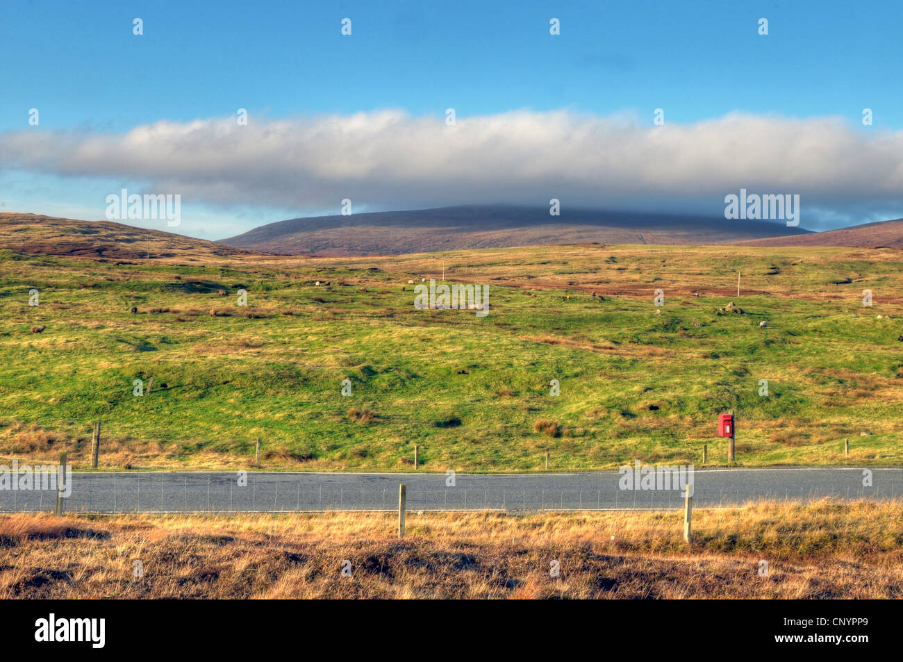 Royal Mail Post Box in rural location on Shetland Scotland Stock Photo