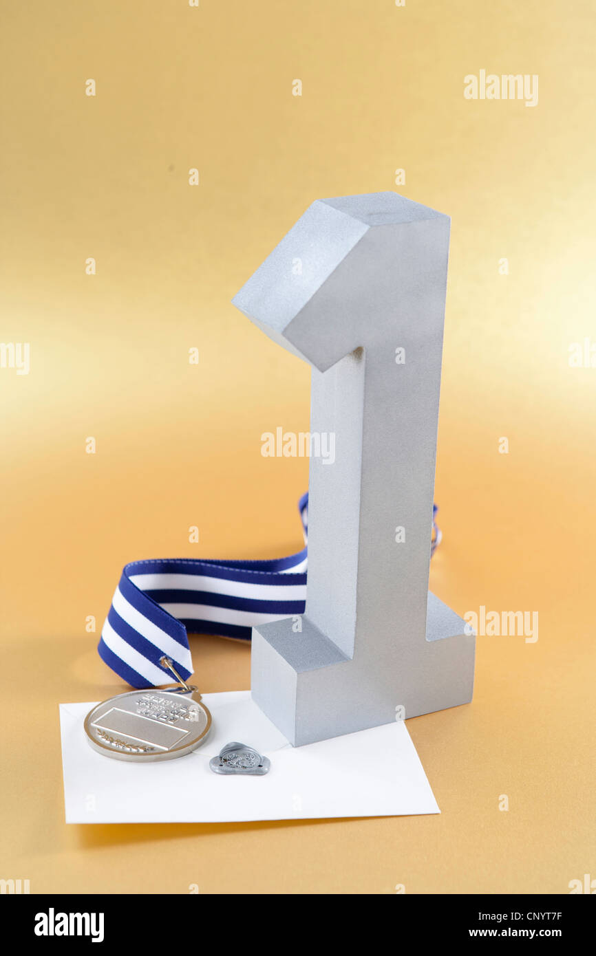 The silver number one, prize medal, and letter of certificate Stock