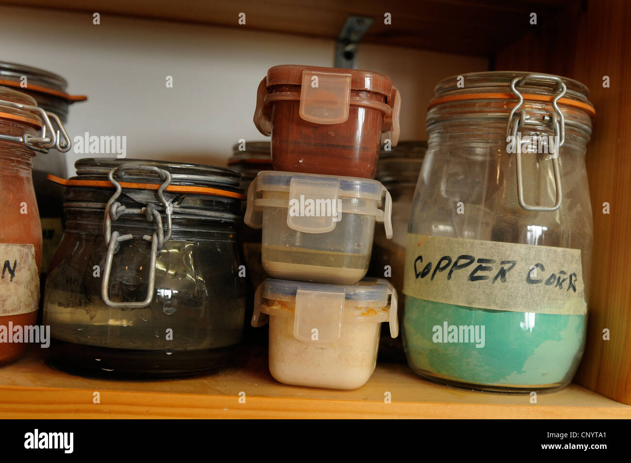 Potter at his wheel and kiln in his Vidlin Shetland Scotland