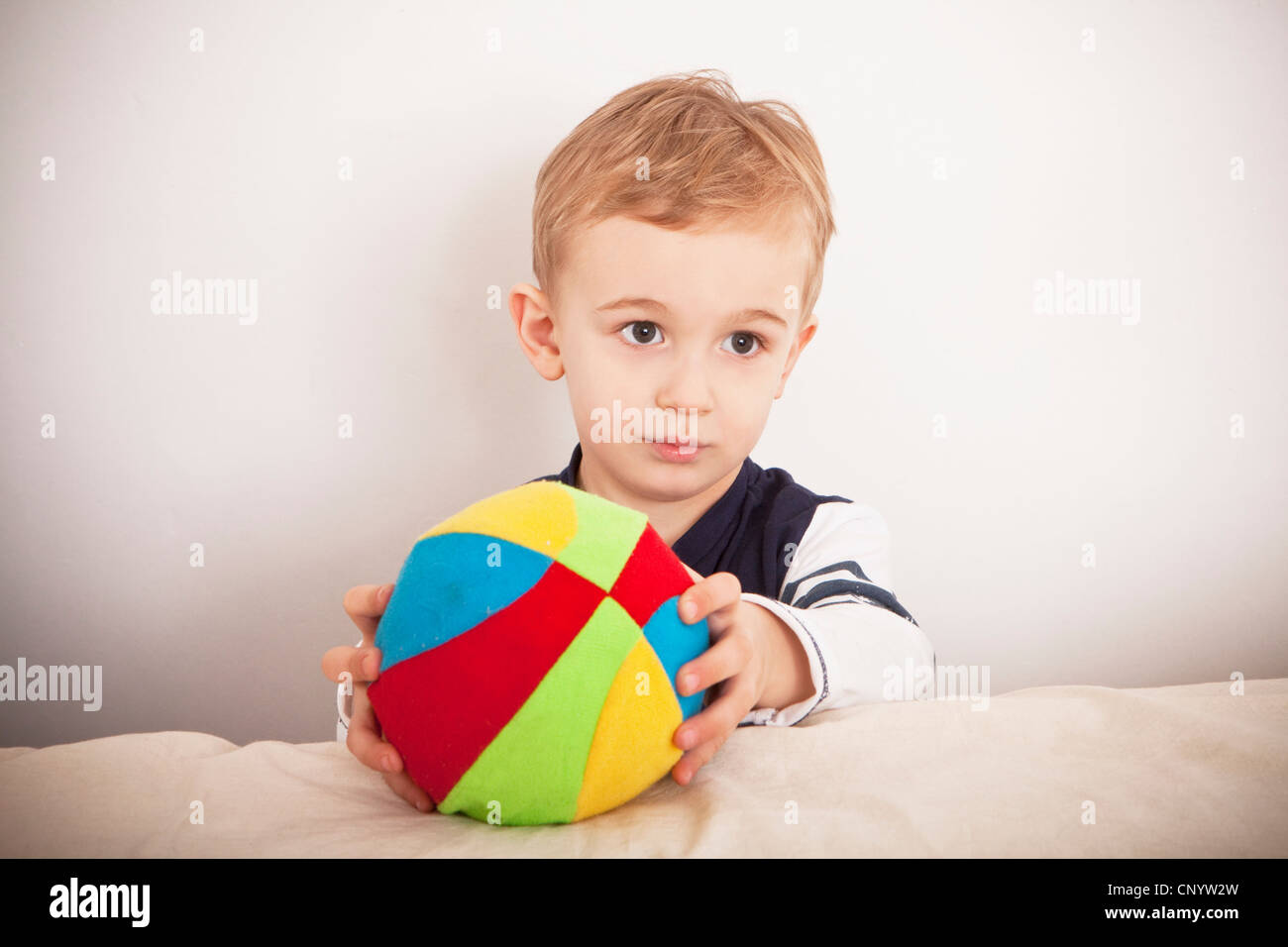 a child playing with ball Stock Photo