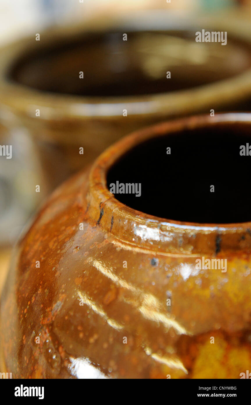 Potter at his wheel and kiln in his Vidlin Shetland Scotland
