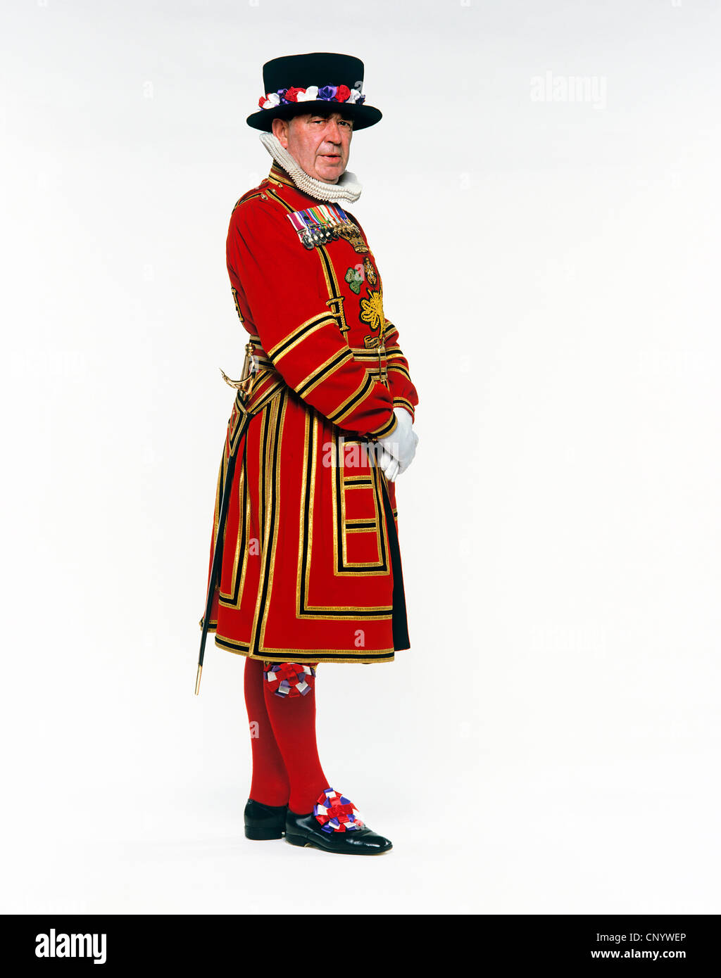 Beefeater or Yeoman Warder at the Tower of London on white background Stock Photo