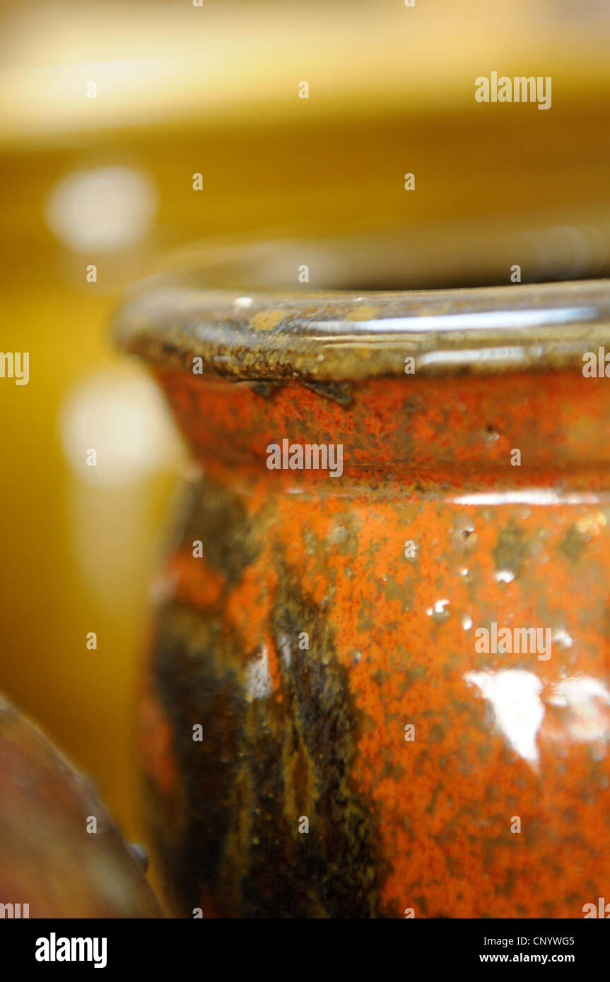 Potter at his wheel and kiln in his Vidlin Shetland Scotland