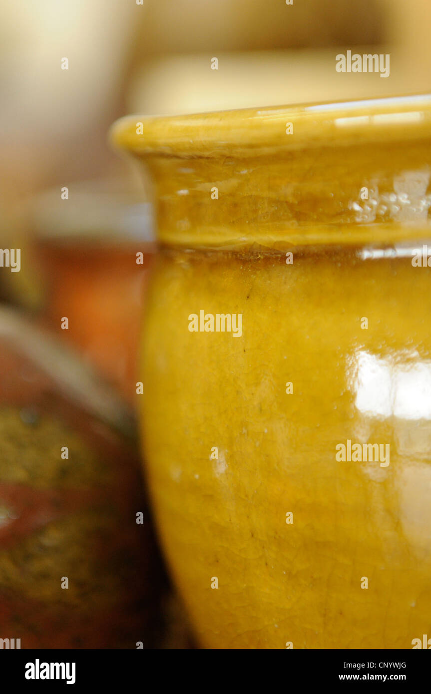 Potter at his wheel and kiln in his Vidlin Shetland Scotland
