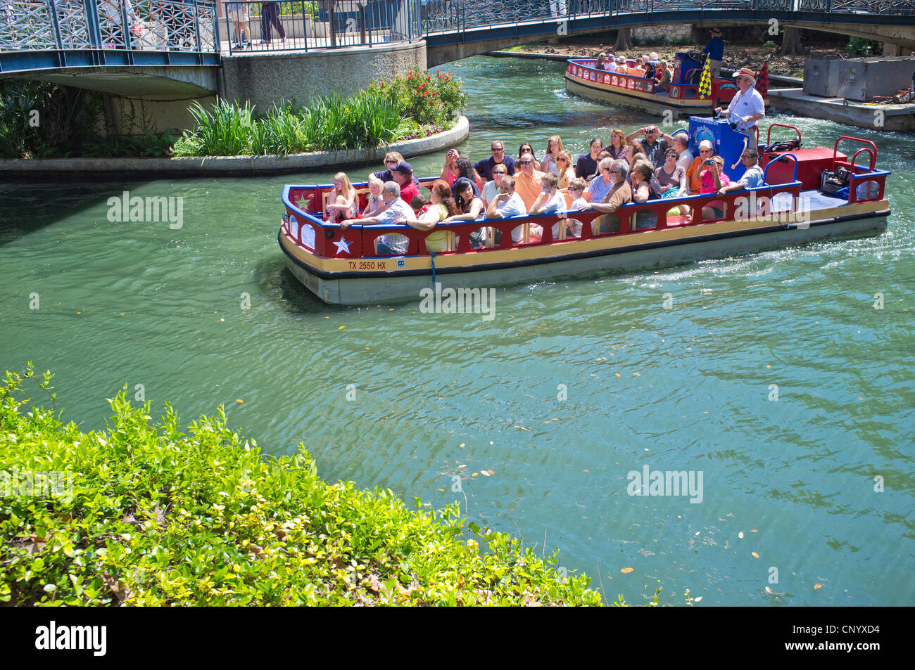 Tourist guide boat at Riverwalk San Antonio Texas Stock Photo