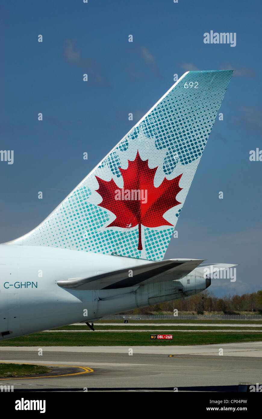 Air Canada logo on the jet tail wing of C-GHPN Boeing 767 33 A/ER. Stock Photo