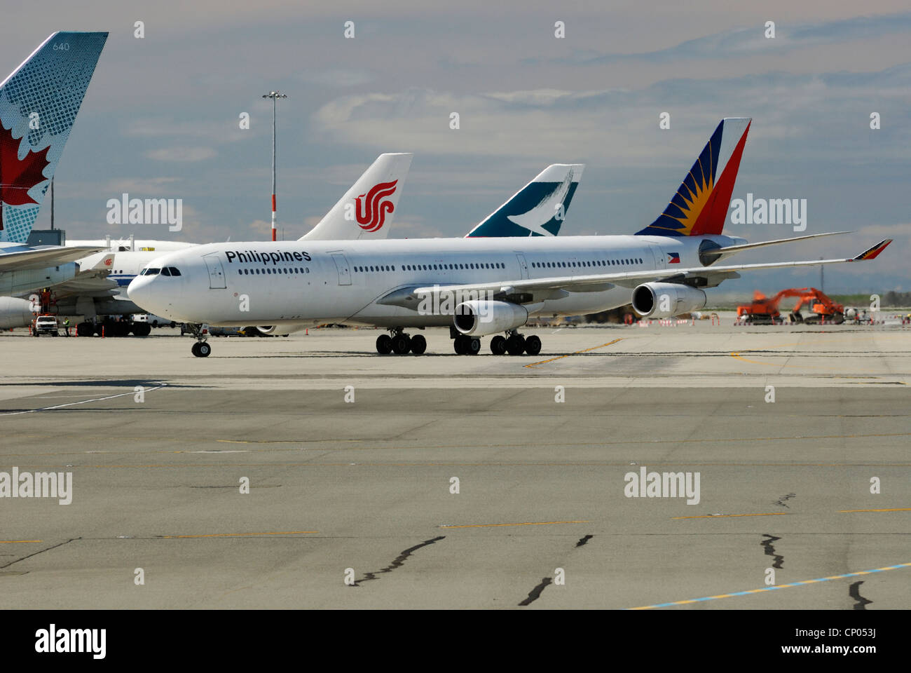 Philippines airline RP-C3430 Airbus A 340 313X arriving at the  Vancouver International Airport terminal. Stock Photo