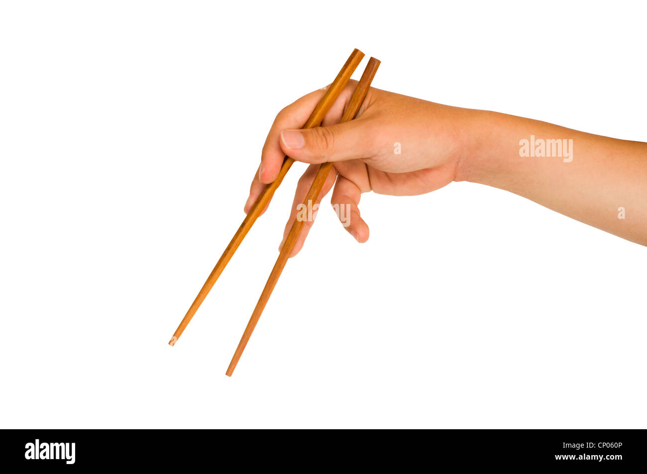 isolated man hand holding wooden chopstick, with clipping path in jpg. Stock Photo