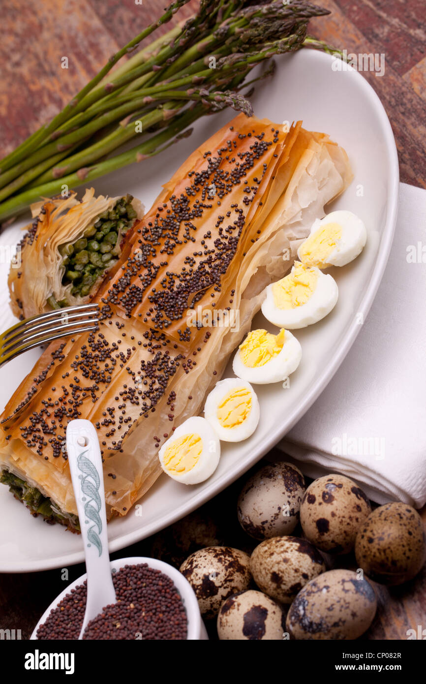 Asparagus In Crust With Quail Eggs Stock Photo Alamy