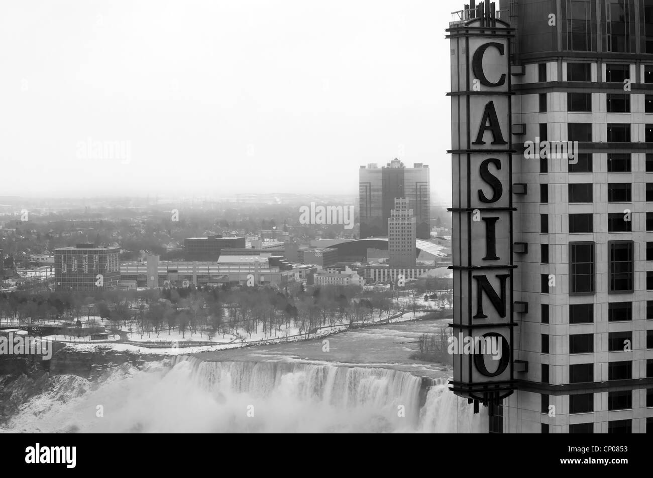 A Casino sign with the US side of Niagara Falls in the background. Stock Photo
