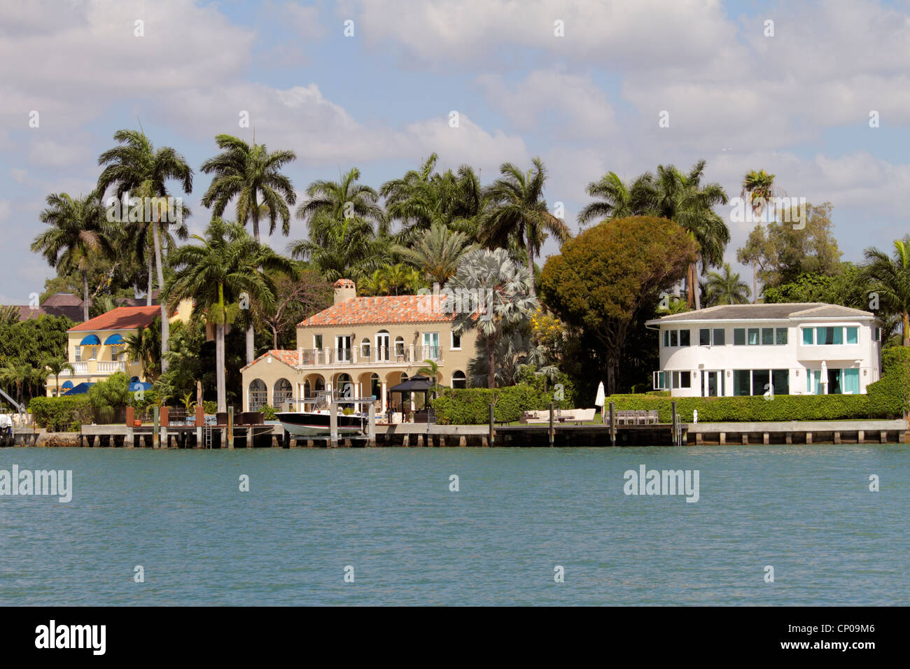 Miami Beach Florida,Biscayne Bay,Venetian Islands,waterfront homes,mansions,palm trees,FL120331305 Stock Photo