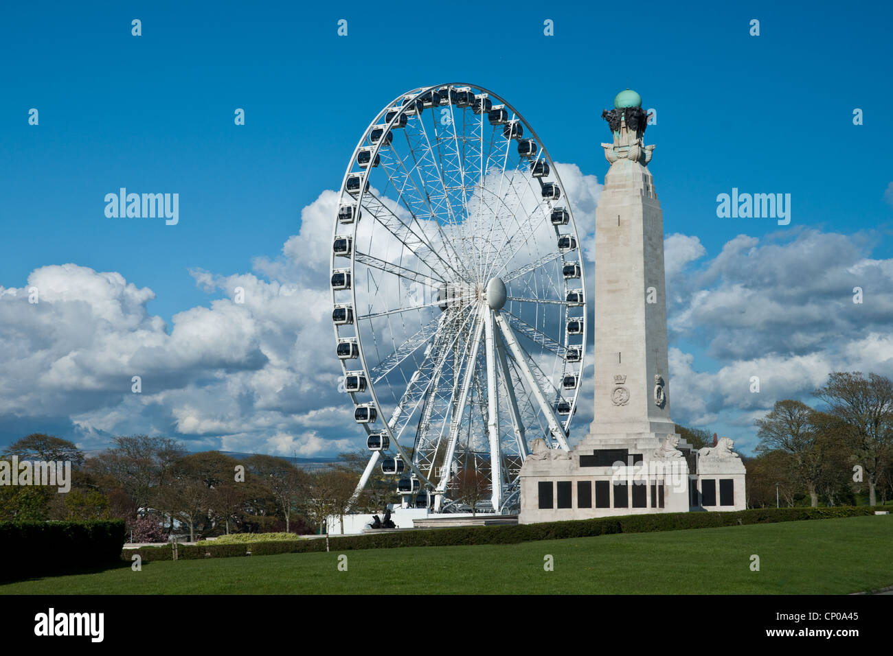 Plymouth Hoe, Devon, England with the war memorial and the big wheel and statue of Drake. Stock Photo