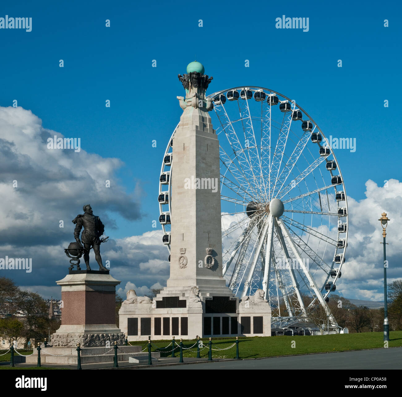 Plymouth Hoe, Devon, England with the war memorial and the big wheel and statue of Drake. Stock Photo
