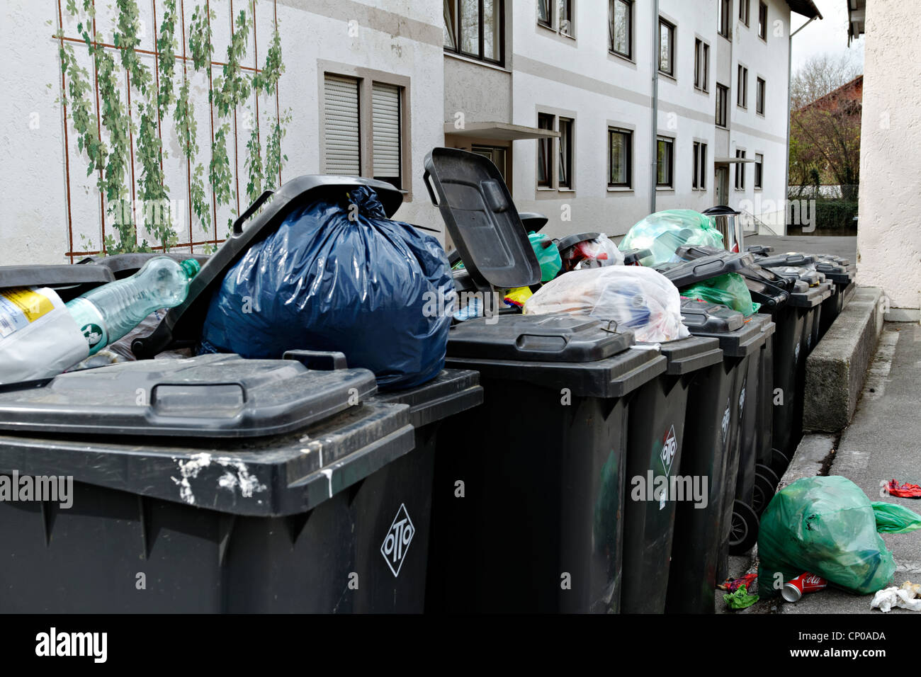 A line of rubbish bins outside a block of flats , Prien Chiemgau Upper