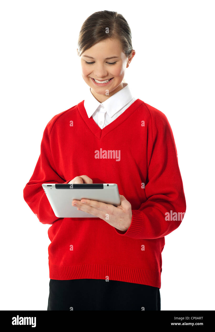 School girl using new touch pad device. Isolated on white Stock Photo