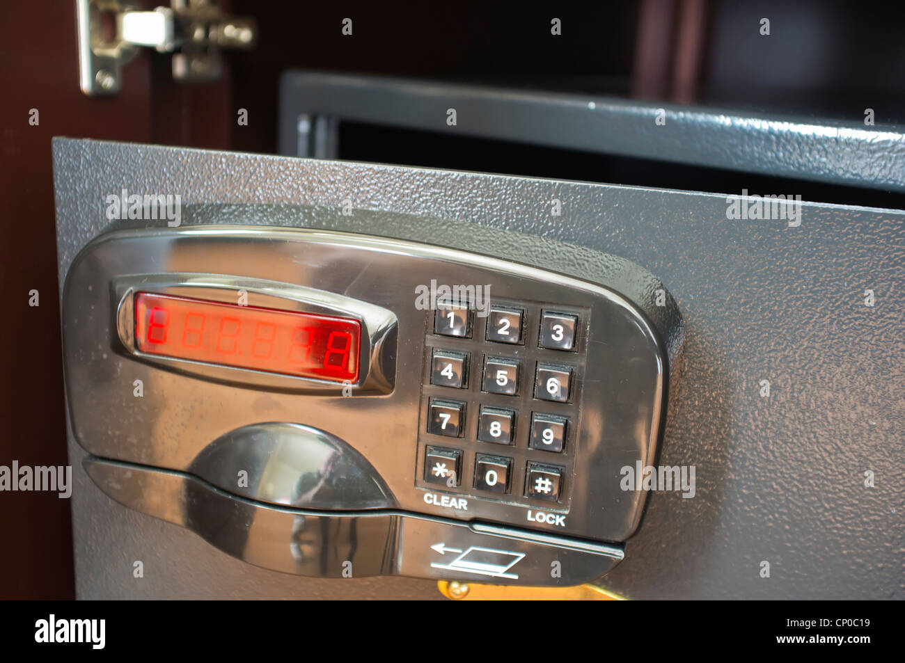 Open hotel room safe with electronic keypad and digital display Stock Photo