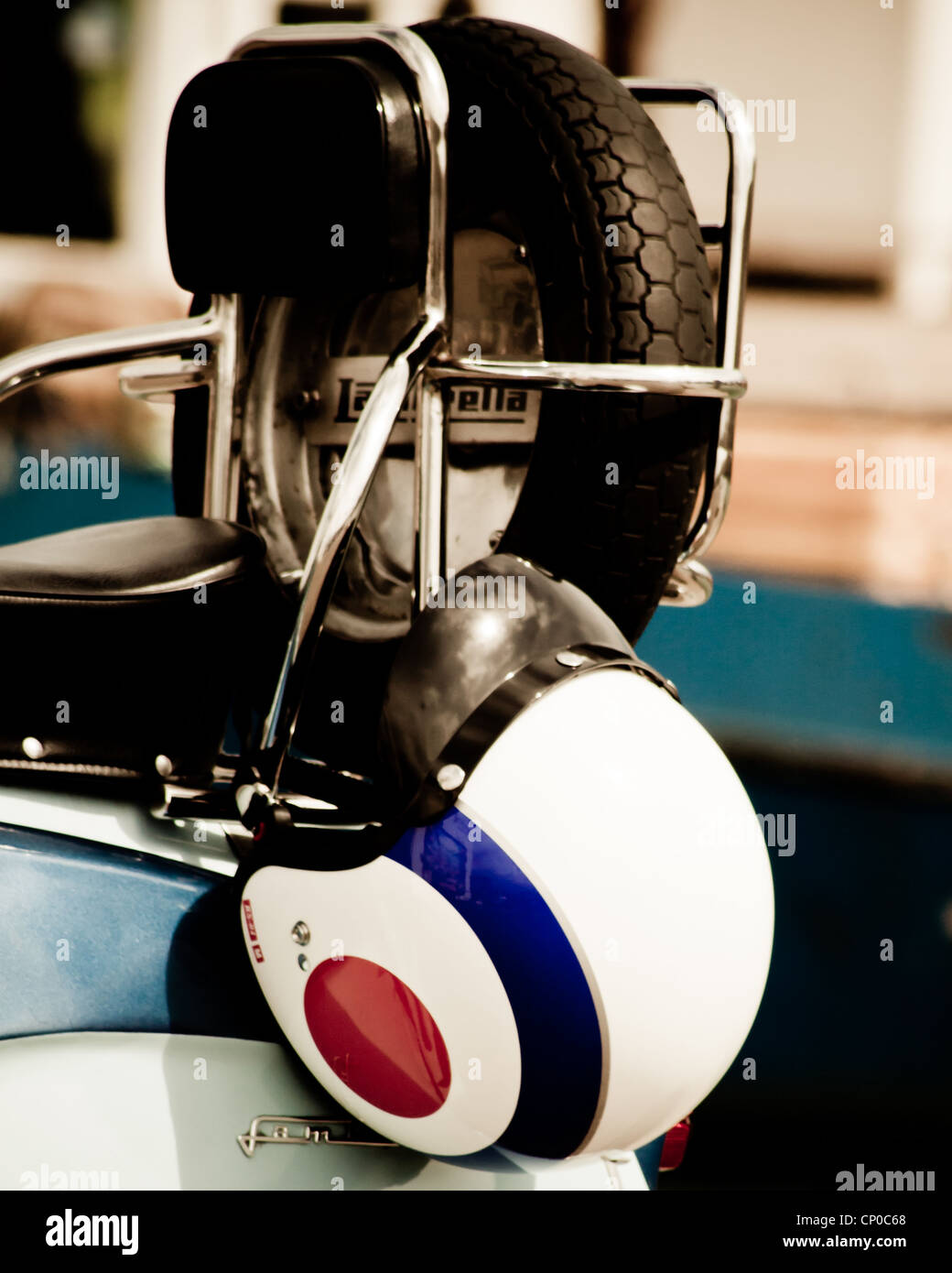 A helmet with target on the back of a Lambretta scooter Stock Photo Alamy
